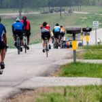 Cyclists and motorist share a highway in Texas.